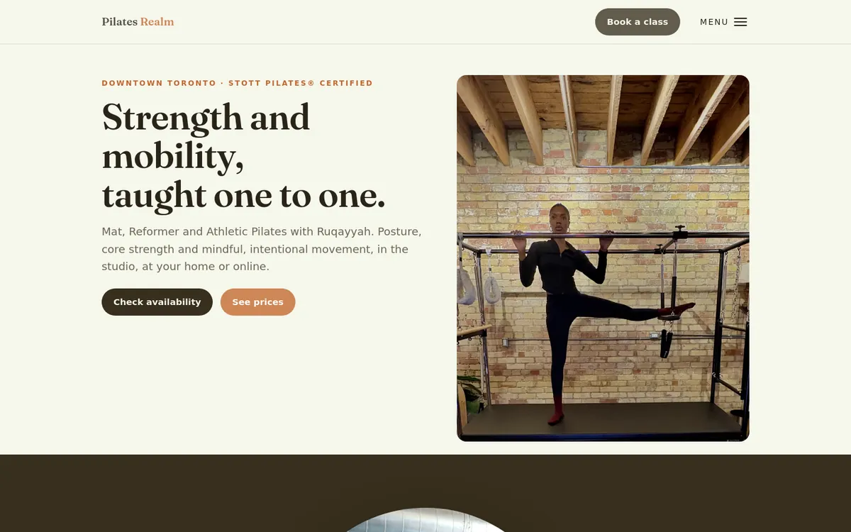 The live pilatesrealm.com site on a laptop and a phone